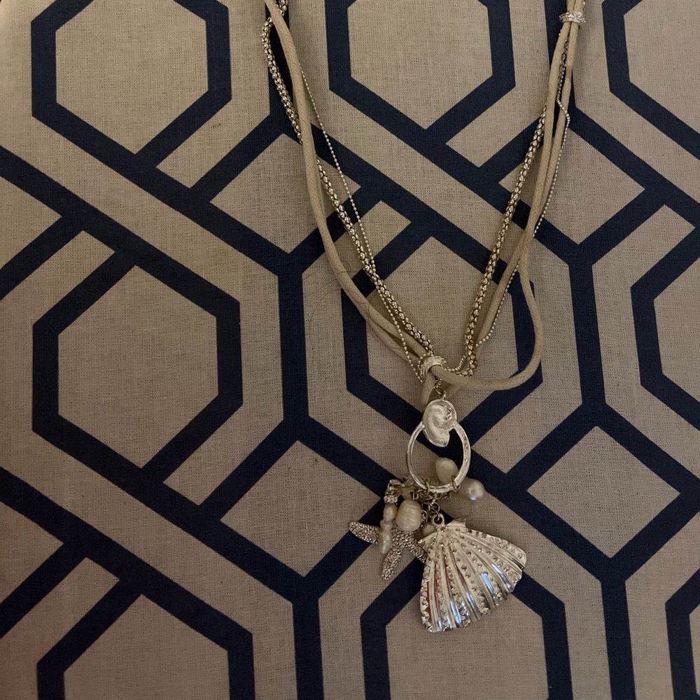 Silver and white cord seashell necklace